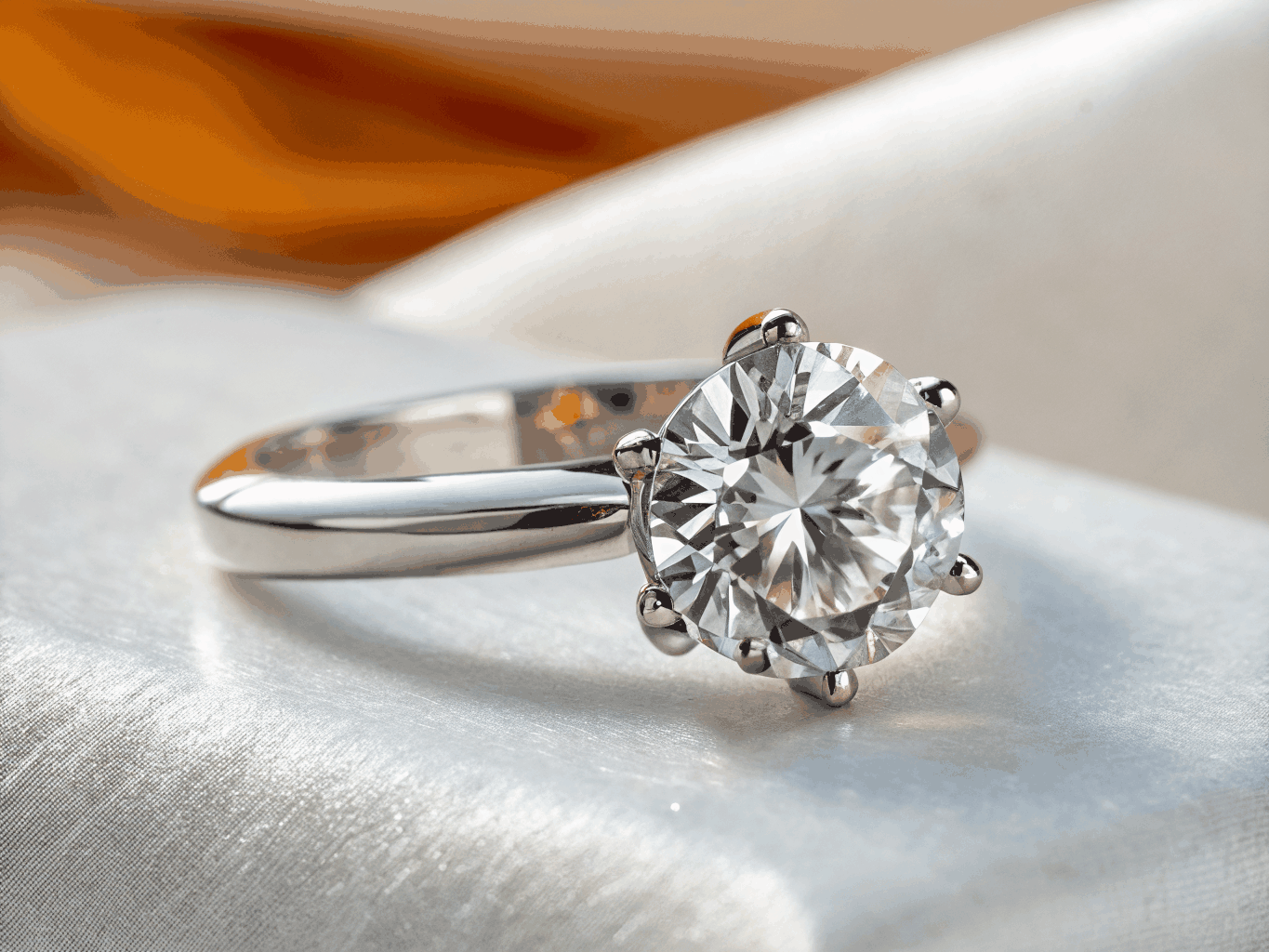 Handcrafted diamond ring on a minimalist studio pedestal